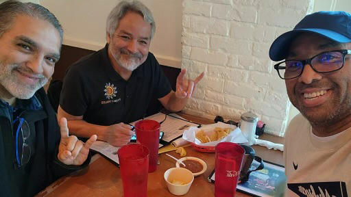 Drs. Campos, Saenz, and Ponjuan dining together